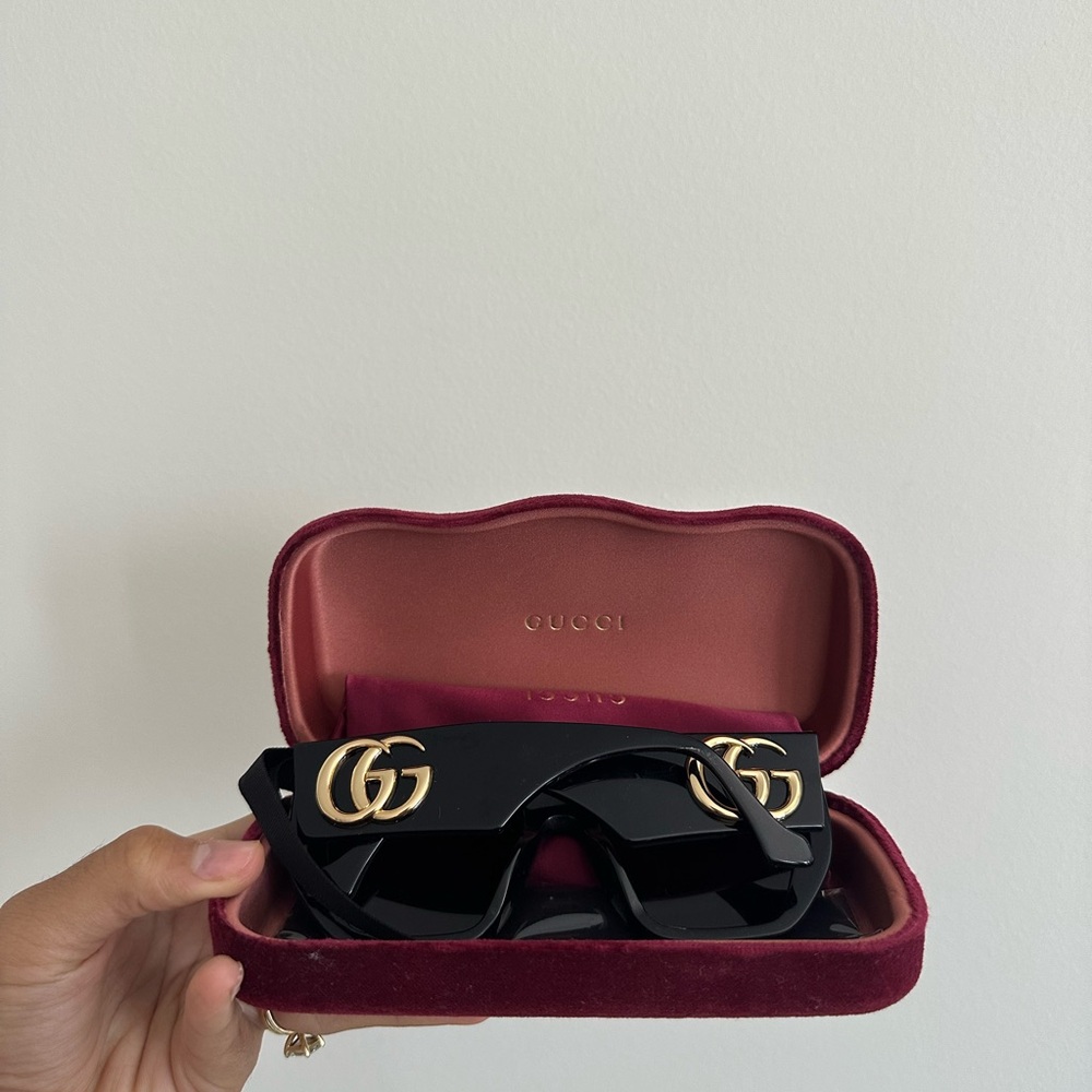 Gucci Black and Gold Sunglasses with Iconic GG Logo